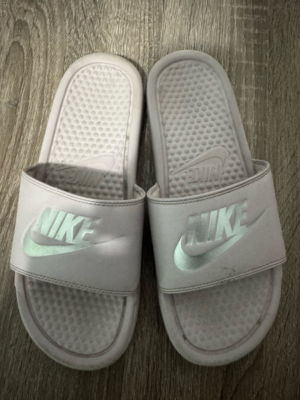 Nike pink Slides with Iridescent Logo